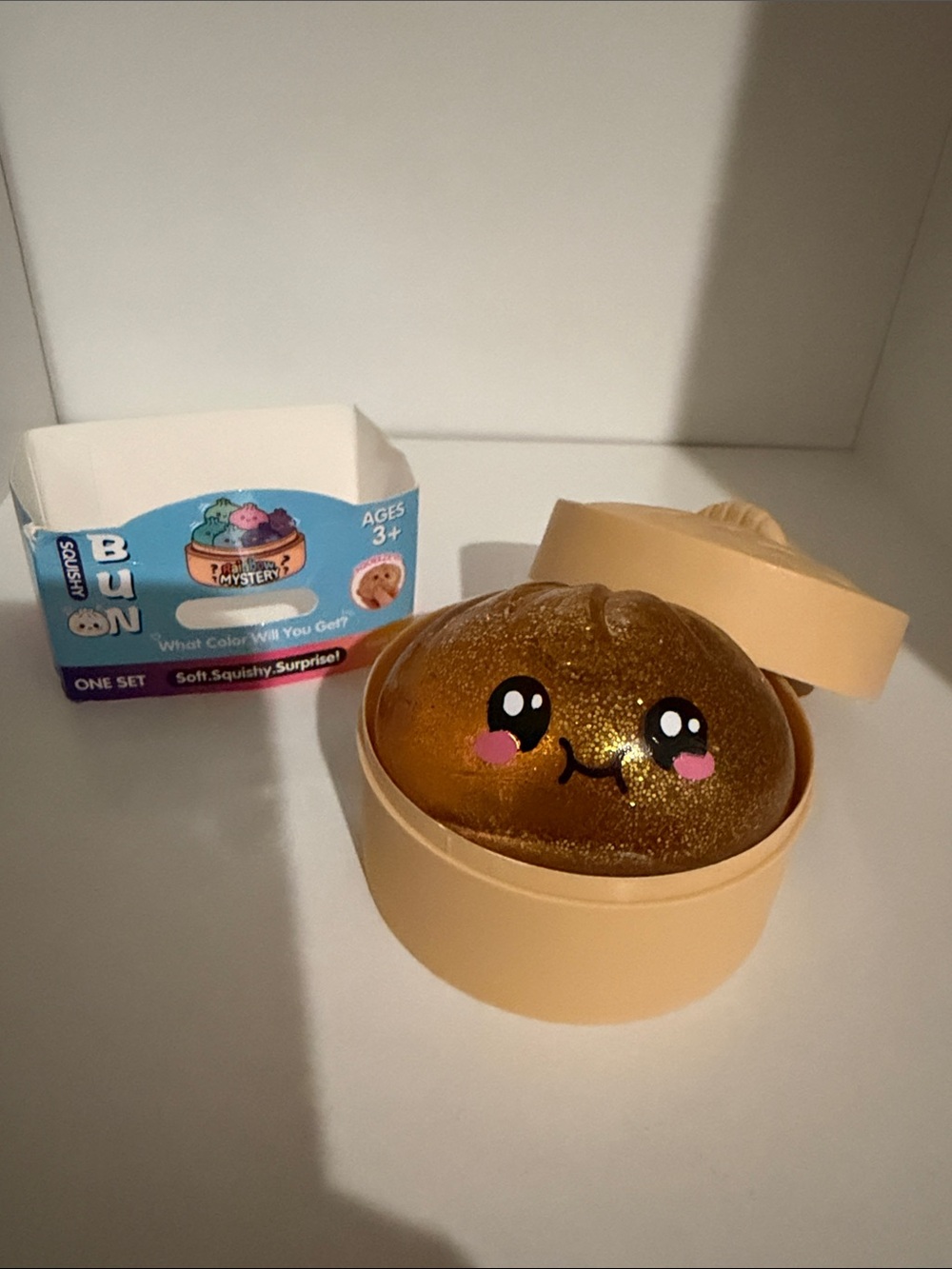 Rare viral golden glitter dumpling mini squishy